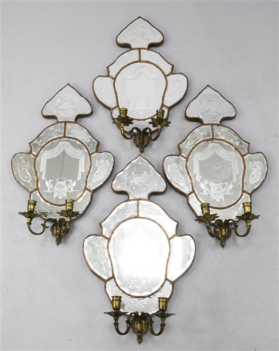 A set of four early 19th century Venetian etched mirrored glass girandoles, overall height 23in.